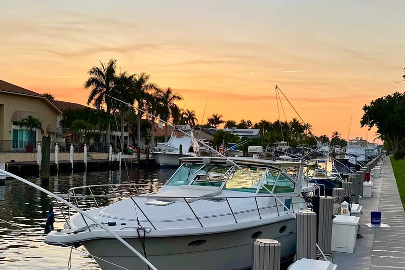 Slide: The Image of Control panel of a 2000 Tiara 37 Open boat with Garmin navigation systems. - 74