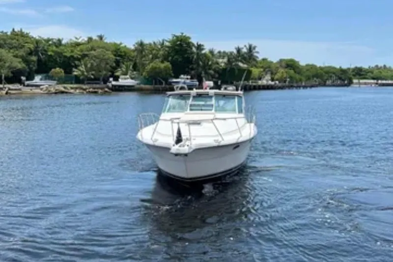 Slide: The Image of Close-up of Tiara 37 Open 2000 boat throttle controls with Garmin equipment. - 9