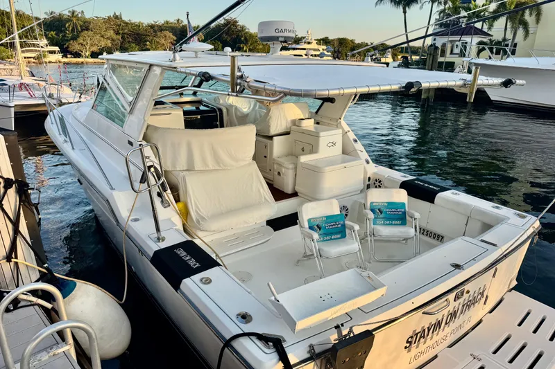 Slide: The Image of Clarion M303 stereo system in a 2000 Tiara 37 Open boat, displaying "INPUT". - 93