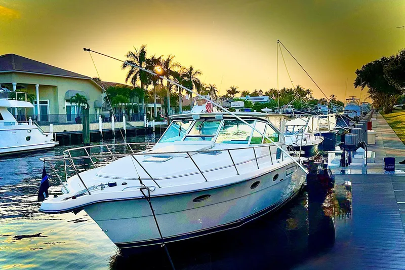 Slide: The Image of Dashboard gauges of a 2000 Tiara 37 Open boat, showing oil pressure and battery levels. - 94