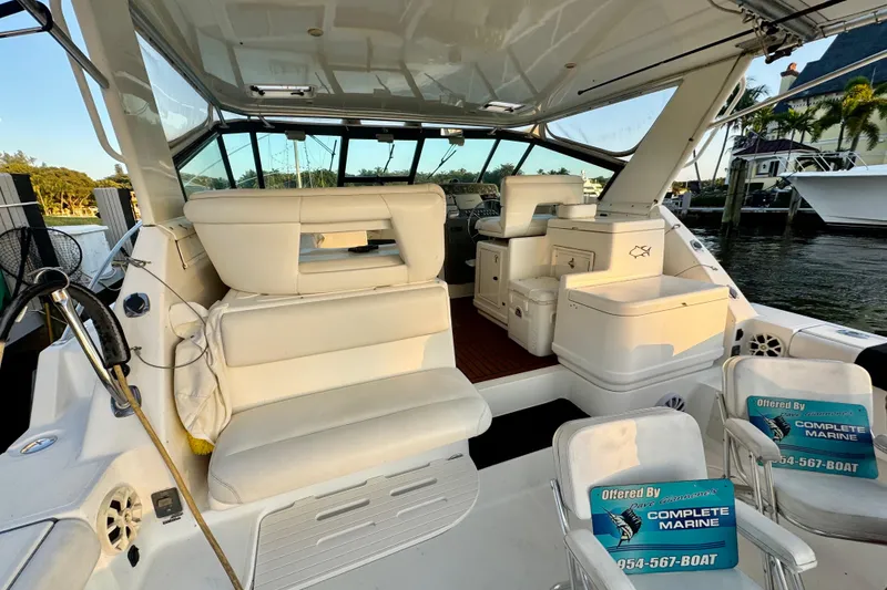 Slide: The Image of Control panel switches on a 2000 Tiara 37 Open boat dashboard. - 95