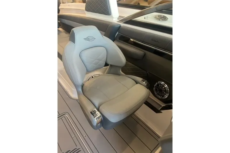 Slide: The Image of Luxury seating in 2025 Chaparral 267 SSX boat, featuring sleek design and premium materials. - 13