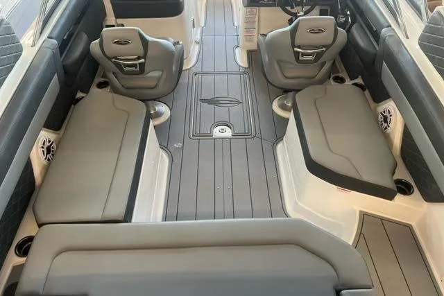 Slide: The Image of Interior of 2025 Chaparral 267 SSX boat with sleek seating and modern design. - 27