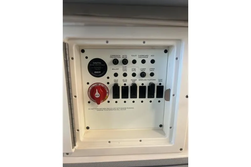 Slide: The Image of Control panel of 2025 Chaparral 267 SSX boat with switches and indicators. - 36