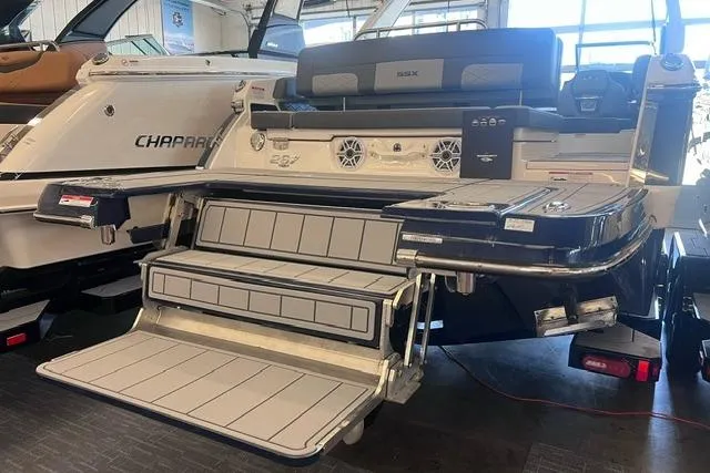 Slide: The Image of 2025 Chaparral 267 SSX boat with extended swim platform and seating area. - 39