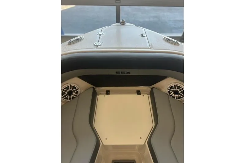 Slide: The Image of 2025 Chaparral 267 SSX boat interior with sleek design and modern features. - 4
