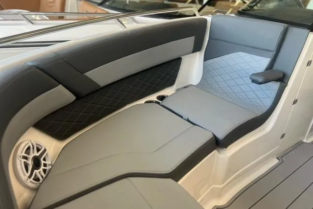 Slide: The Image of 2025 Chaparral 267 SSX boat interior with sleek, modern seating and stylish design. - 6