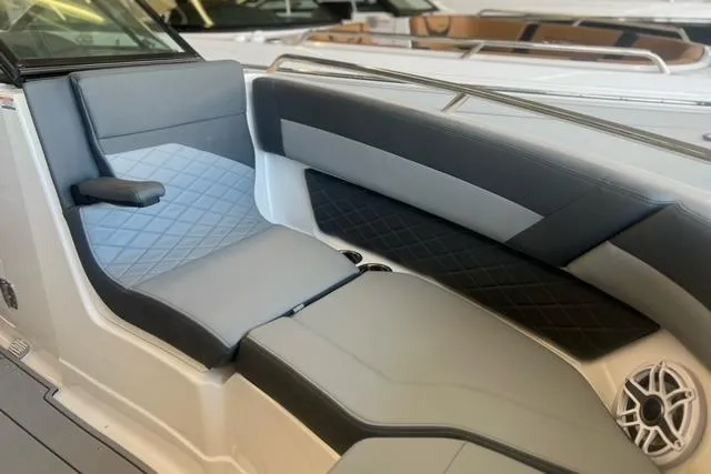 Slide: The Image of 2025 Chaparral 267 SSX boat interior with luxurious seating and modern design. - 7