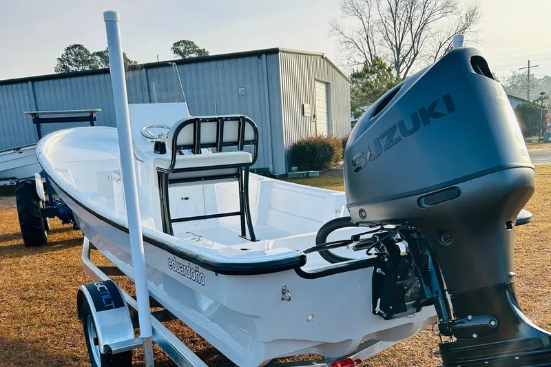 Slide: The Image of 2025 Eduardono Panga 22 boat with Suzuki outboard motor on trailer. - 3