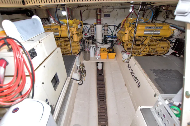 Slide: The Image of Engine room of 1985 Gulfstar 44 Motor Yacht with Caterpillar engines and equipment. - 75