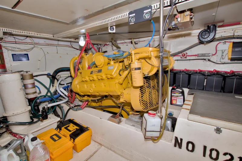 Slide: The Image of Engine room of 1985 Gulfstar 44 Motor Yacht with CAT 3208 engine. - 82