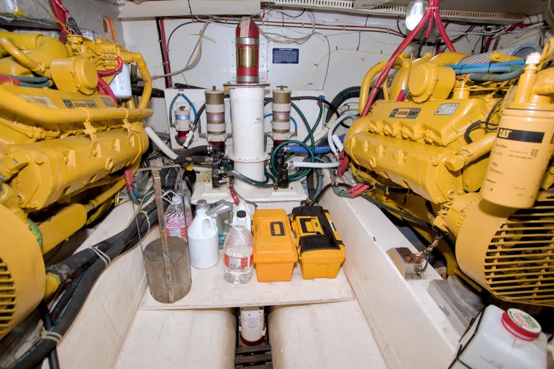 Slide: The Image of Engine room of 1985 Gulfstar 44 Motor Yacht with dual Caterpillar engines. - 87