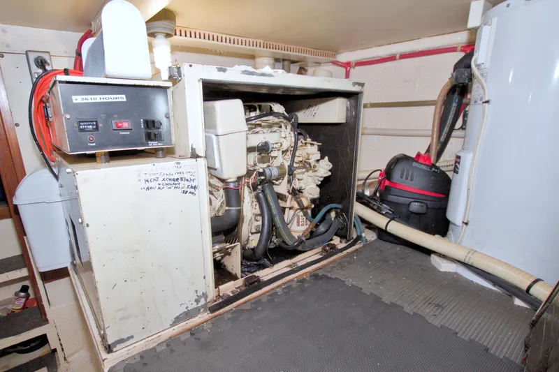 Slide: The Image of Engine room of 1985 Gulfstar 44 Motor Yacht with generator and equipment. - 91