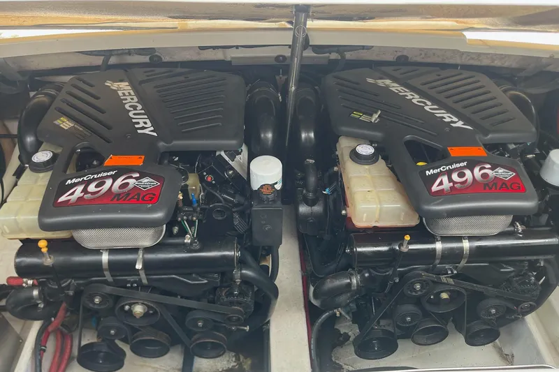 Slide: The Image of Twin MerCruiser 496 MAG engines in a 2002 Formula 330 Sun Sport boat. - 37