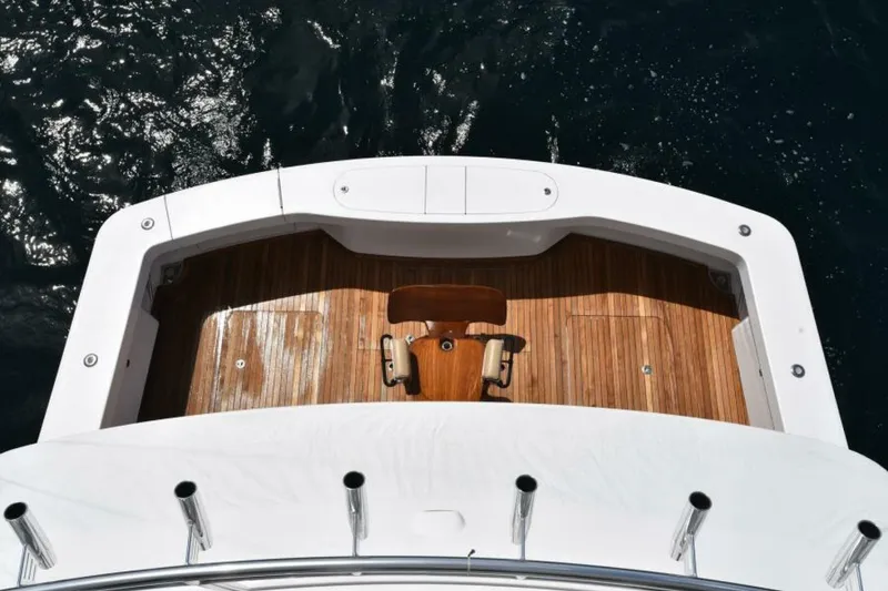 Slide: The Image of 2017 Viking 80 Sky Bridge yacht with teak deck, viewed from above. - 113