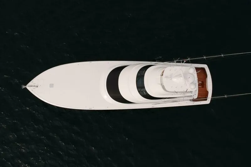 Slide: The Image of Aerial view of 2017 Viking 80 Sky Bridge yacht on dark water. - 5