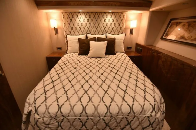 Slide: The Image of Luxurious bedroom interior of 2017 Viking 80 Sky Bridge yacht with elegant bedding. - 68