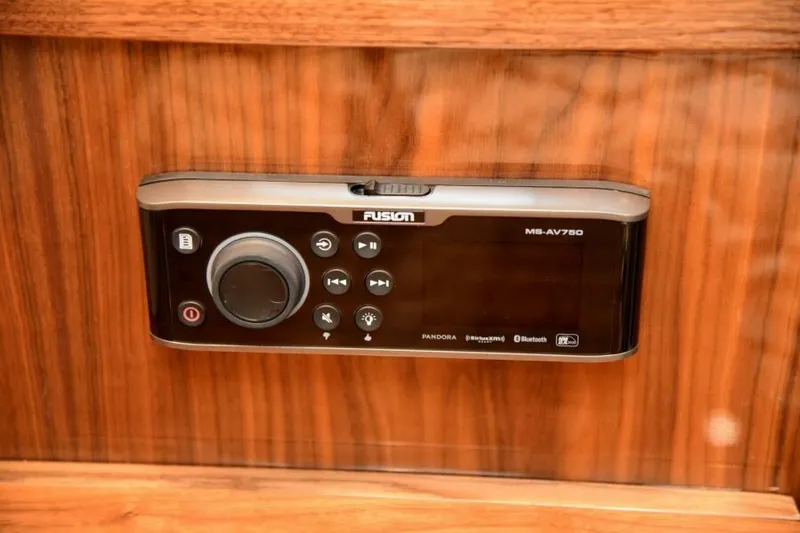Slide: The Image of Fusion MS-AV750 audio system on 2017 Viking 80 Sky Bridge yacht, mounted on wood panel. - 71