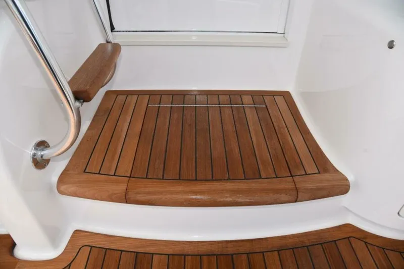 Slide: The Image of Teak deck detail on 2017 Viking 80 Sky Bridge yacht. - 91