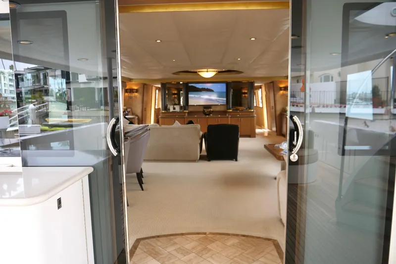 Slide: The Image of Luxurious interior of a 2000 Westport 112 yacht, featuring elegant furnishings and modern design. - 73