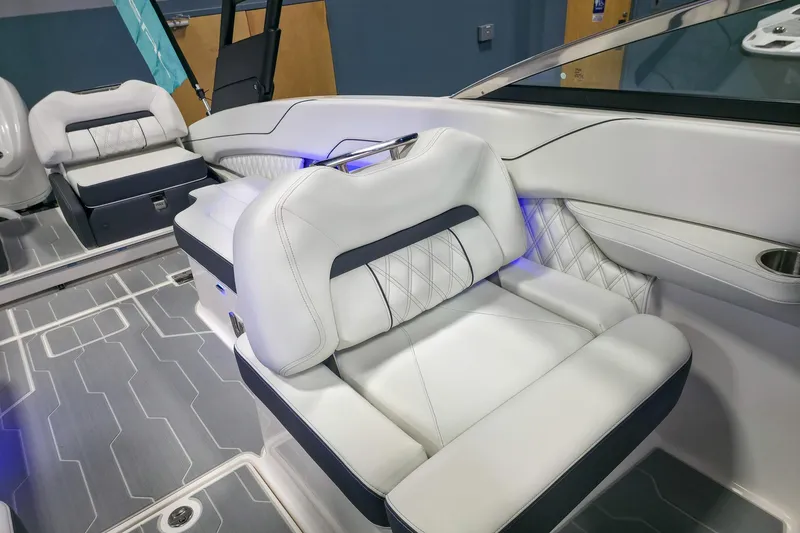 Slide: The Image of Luxurious interior of 2026 Regal LX6 boat with plush white seating. - 13