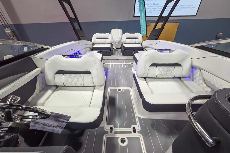 Slide: The Image of 2026 Regal LX6 boat interior with luxurious white seating and modern design. - 9