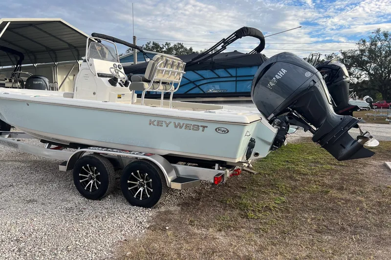 Slide: The Image of 2026 Key West 230 Bay Reef boat on trailer with Yamaha outboard motor. - 3