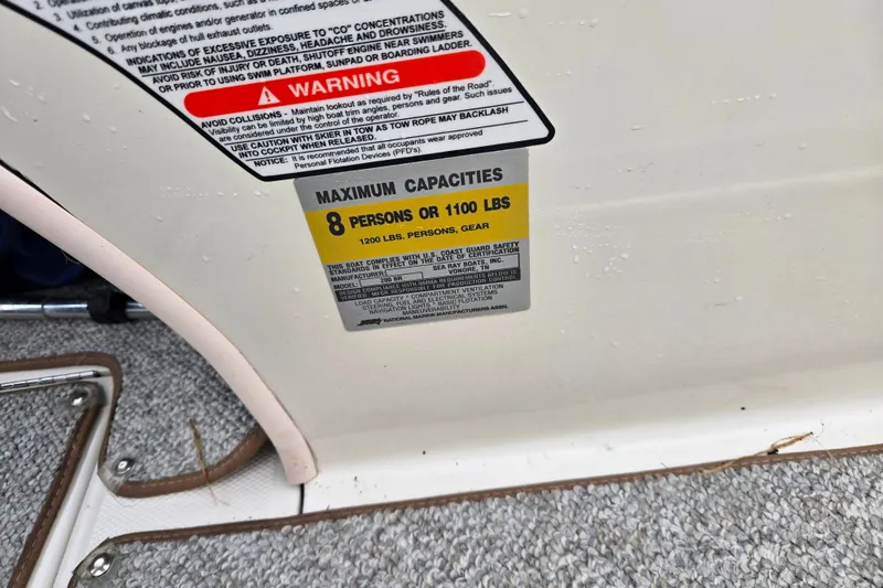 Slide: The Image of 2004 Sea Ray 200 Sport capacity warning label, maximum 8 persons or 1100 lbs. - 15