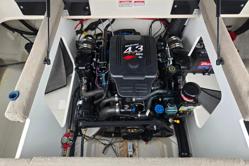 Slide: The Image of Engine compartment of a 2004 Sea Ray 200 Sport with MerCruiser 4.3 MPI engine. - 23