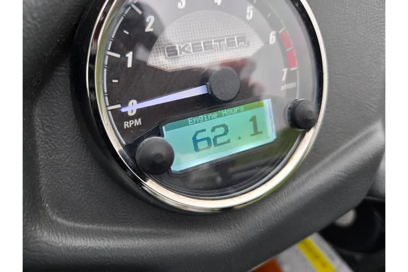 Slide: The Image of Close-up of 2021 Skeeter FXR20 tachometer showing 62.1 engine hours. - 16
