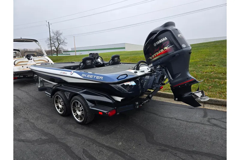 Slide: The Image of 2021 Skeeter FXR20 boat with Yamaha VMAX engine on a trailer. - 3