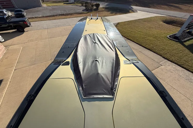 Slide: The Image of Top view of a 2002 MTI 40RP boat with a covered cockpit. - 15