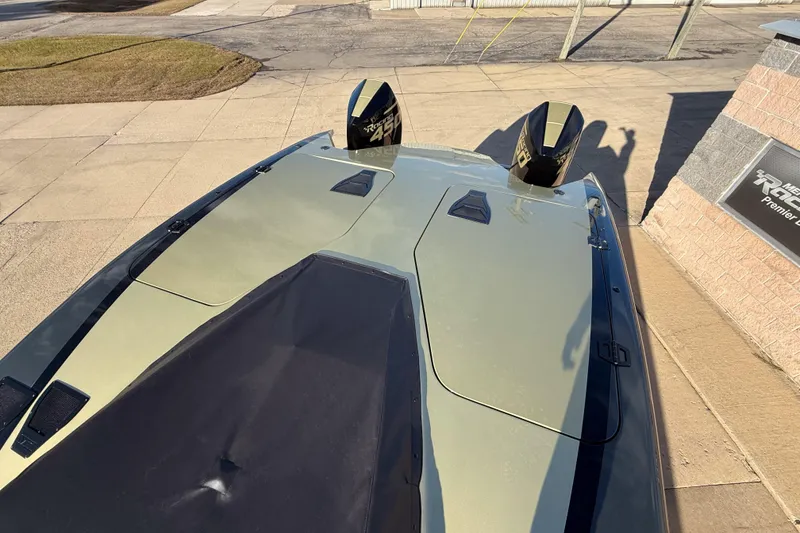 Slide: The Image of Top view of a 2002 MTI 40RP boat with dual engines on a concrete surface. - 17