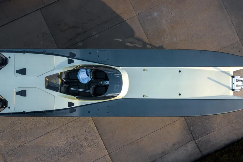 Slide: The Image of Aerial view of 2002 MTI 40RP powerboat on concrete surface. - 2