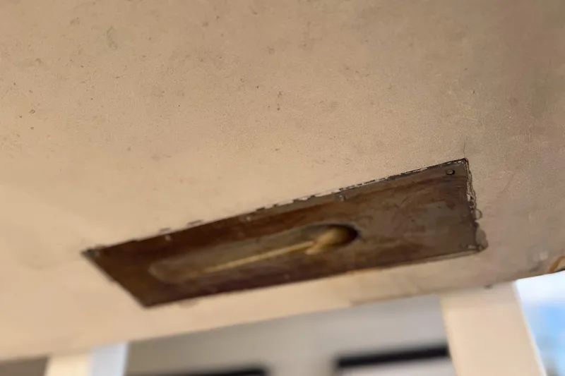 Slide: The Image of Underside view of 2002 MTI 40RP boat hull with metal plate detail. - 35