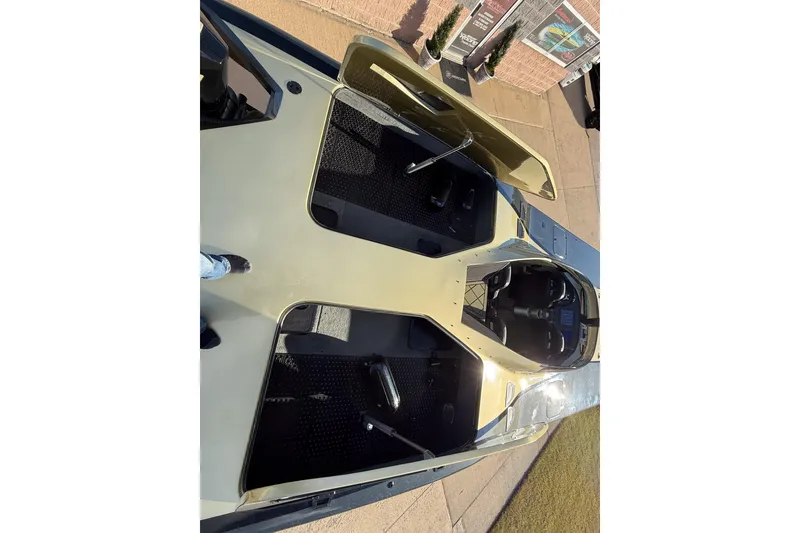 Slide: The Image of 2002 MTI 40RP boat interior with open cockpit and seating area. - 7