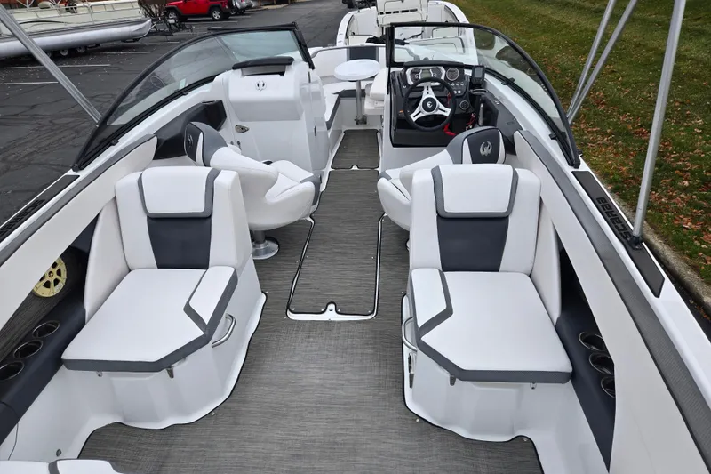 Slide: The Image of 2021 Scarab 255 ID boat interior with modern seating and sleek design. - 10