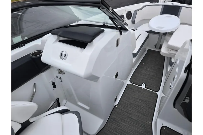 Slide: The Image of 2021 Scarab 255 ID boat interior with seating, table, and modern design. - 14