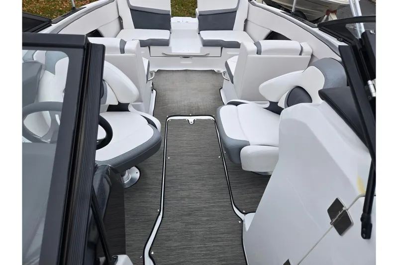 Slide: The Image of Interior of 2021 Scarab 255 ID boat with modern seating and sleek design. - 25