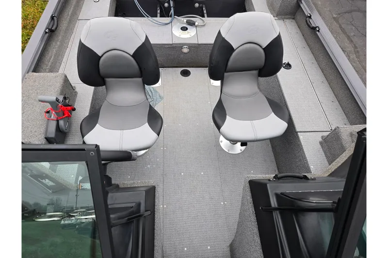 Slide: The Image of 2022 G3 Angler V164 F boat interior with two gray and black seats. - 19