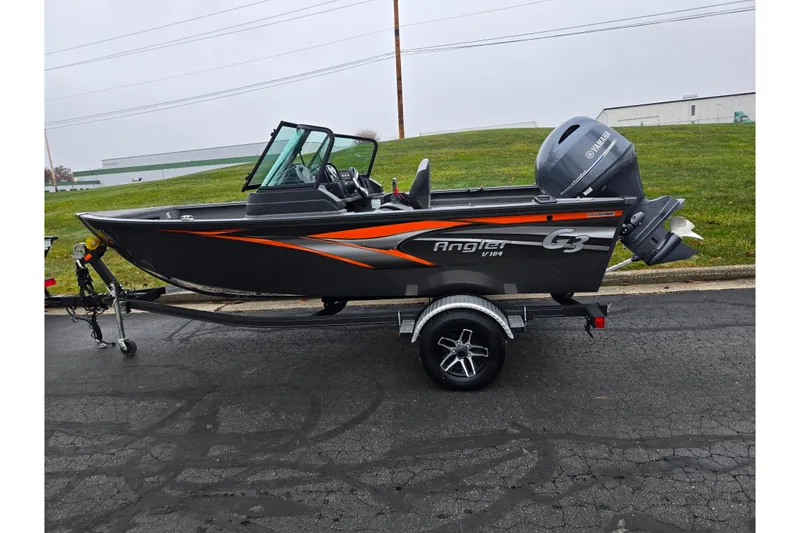 Slide: The Image of 2022 G3 Angler V164 F fishing boat on trailer, featuring Yamaha outboard motor. - 4