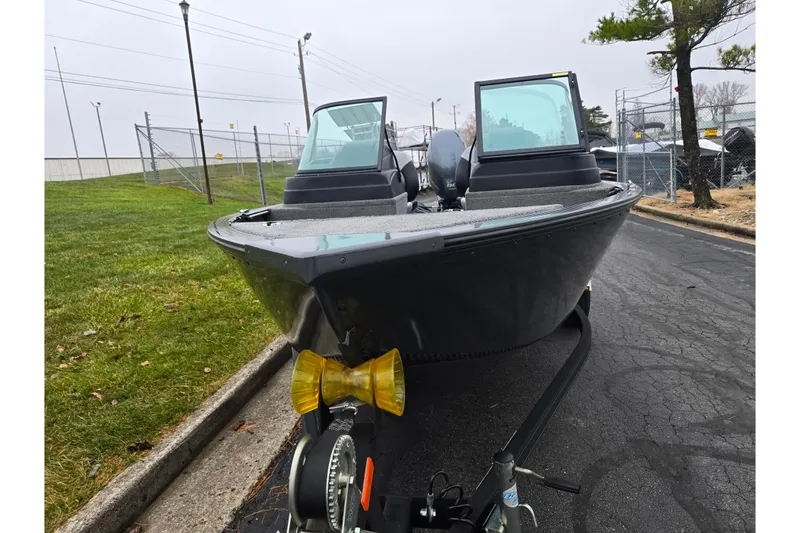 Slide: The Image of 2022 G3 Angler V164 F boat on trailer, parked on roadside. - 6