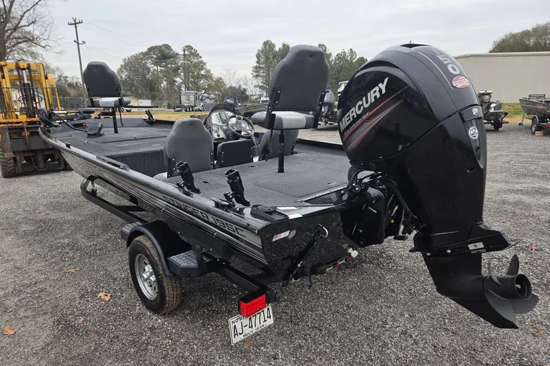 Slide: The Image of 2018 Lowe Stinger 195C boat with Mercury outboard motor on a trailer. - 5