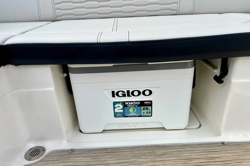 Slide: The Image of 2023 Searay SPX230 boat with Igloo cooler under seat storage. - 22