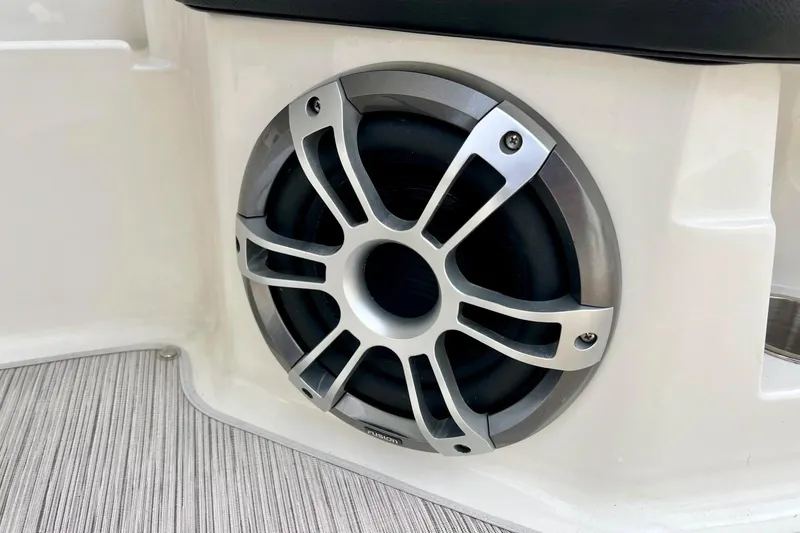 Slide: The Image of 2023 Searay SPX230 boat speaker with sleek silver grille design. - 38