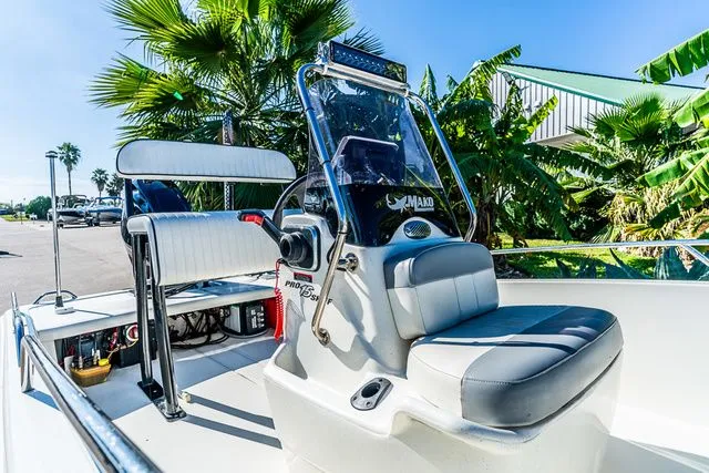 Slide: The Image of 2022 Mako SKIFF 15CC boat with console and seating. - 7
