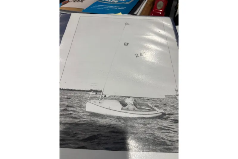 Slide: The Image of 1994 STUR D CAT sailboat on water, black and white photo. - 5