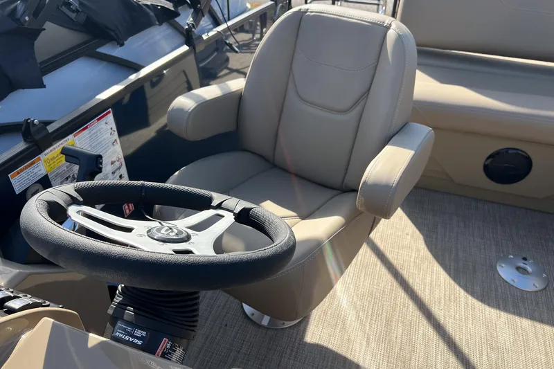 Slide: The Image of Captain's chair and steering wheel of 2026 Sylvan Mirage 822 CLZ pontoon boat. - 18