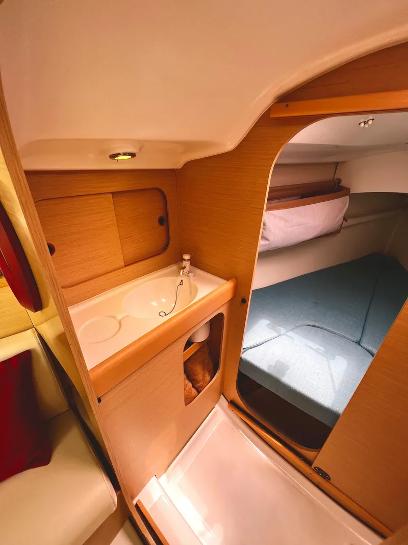 Slide: The Image of Interior of 2014 Beneteau FIRST 25 S yacht cabin. - 20