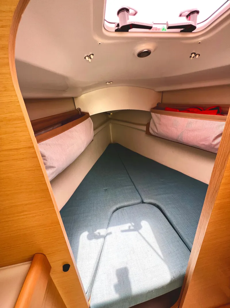 Slide: The Image of Interior of a 2014 Beneteau FIRST 25 S yacht, cozy sleeping cabin. - 22